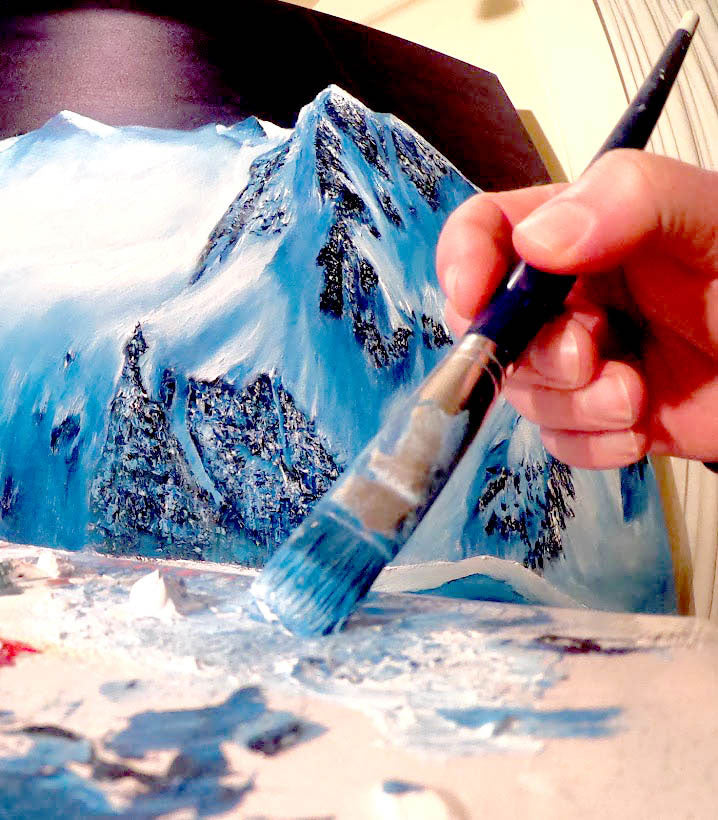 about artist graham watts painting process , painting a mountain scene with a brush